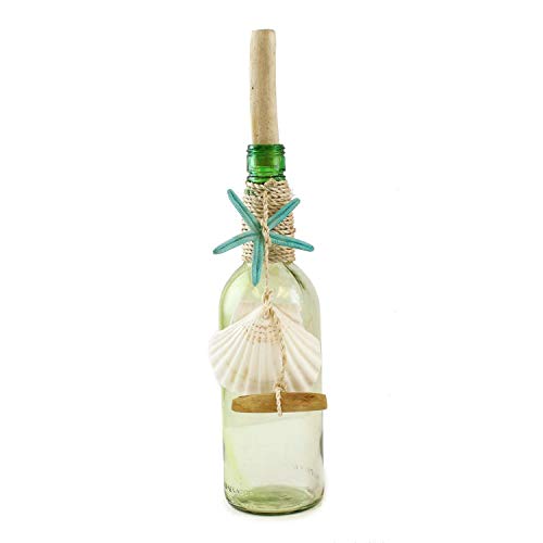 Beachcombers Ocean Glass Bottle Decorated with Shells and a piece of Driftwood.