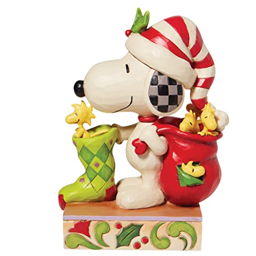 Enesco Peanuts by Jim Shore Snoopy with Woodstocks and a Stocking Figurine, 7 Inch, Multicolor