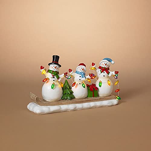Gerson 2603930 Battery Operated Lighted Resin Skiing Snowman Family with Light String 12.6" L